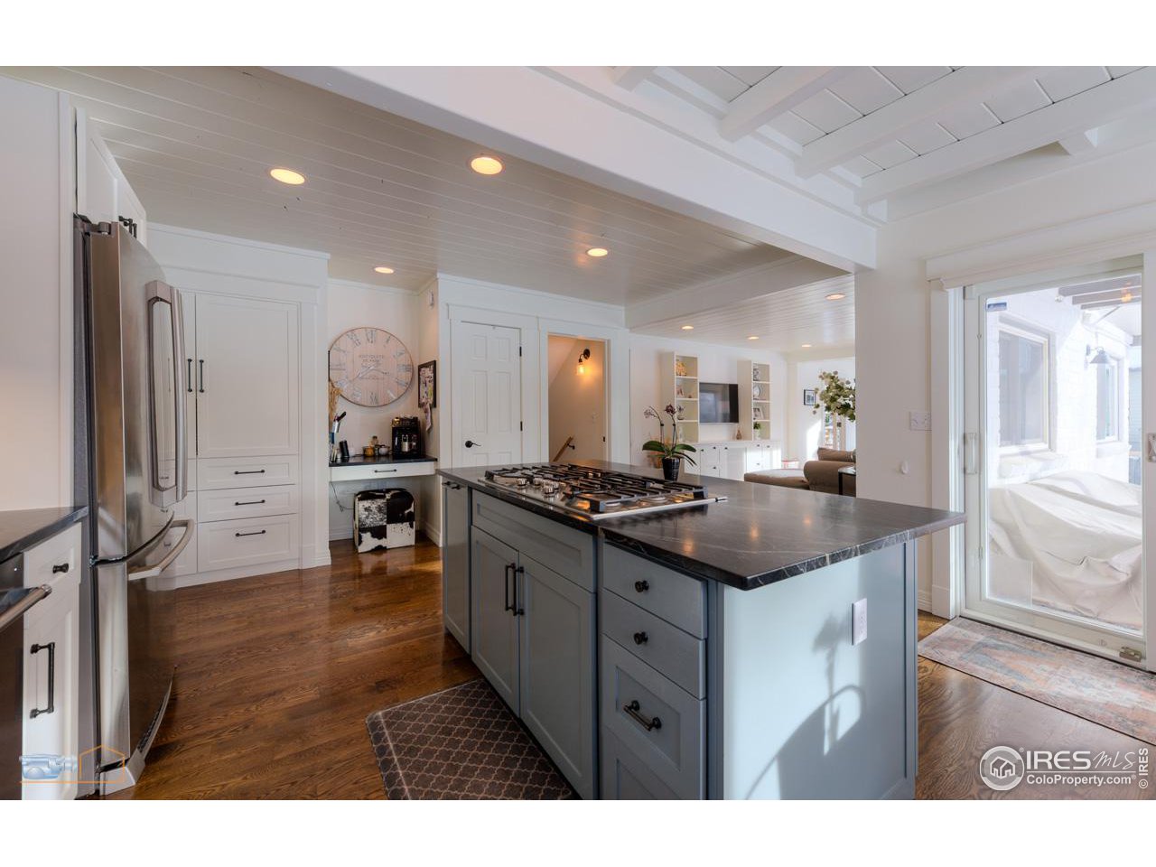 4881 Valkyrie Drive Boulder, CO 80301 - Photo 8 of 39 a kitchen with stainless steel appliances granite countertop a sink stove and cabinets