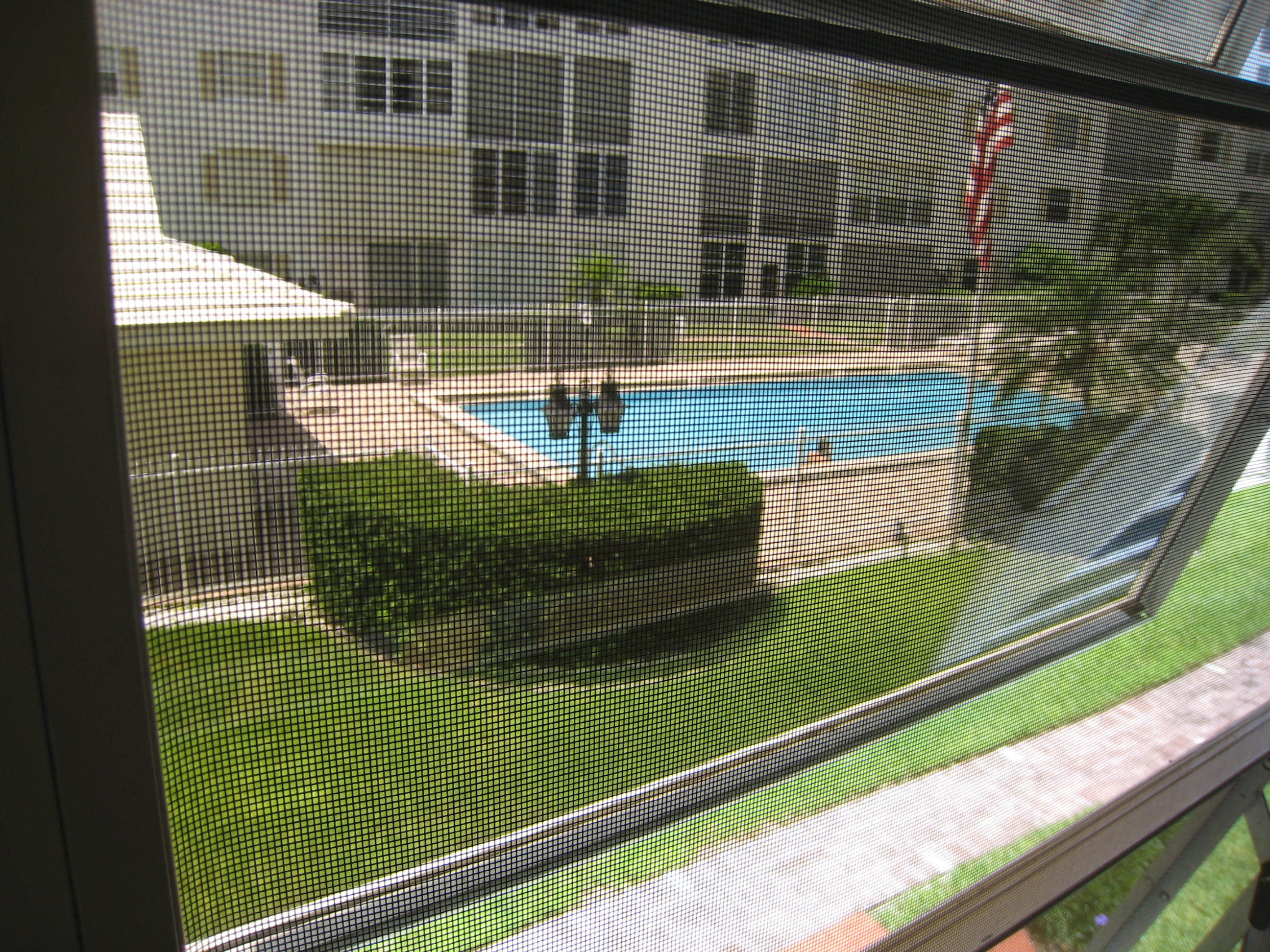 304 Golfview Road, Unit 203 North Palm Beach, FL 33408 - Photo 16 of 29 view from patio of pool 4791