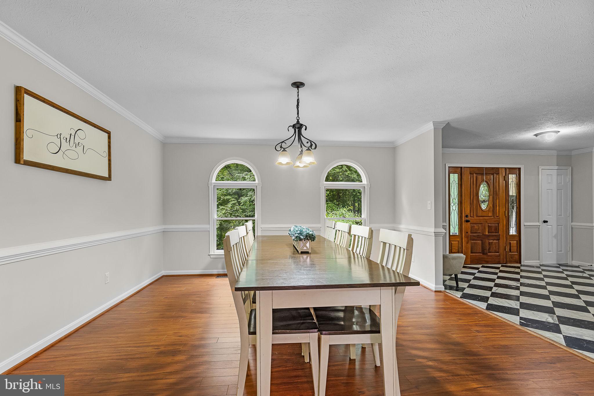 104 Dent Road Stafford, VA 22554 - Photo 16 of 118 a view of a dining room with furniture window and wooden floor