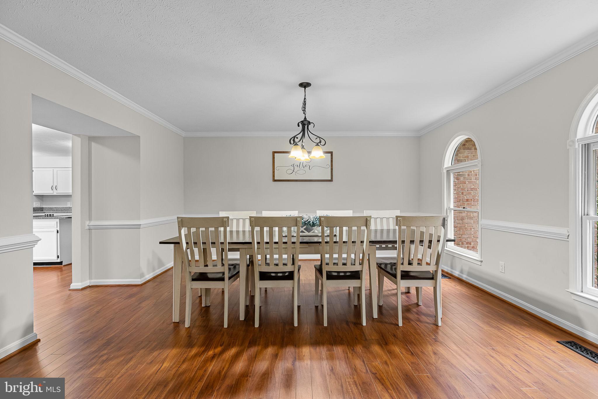 104 Dent Road Stafford, VA 22554 - Photo 17 of 118 a view of a dining room with furniture window and wooden floor