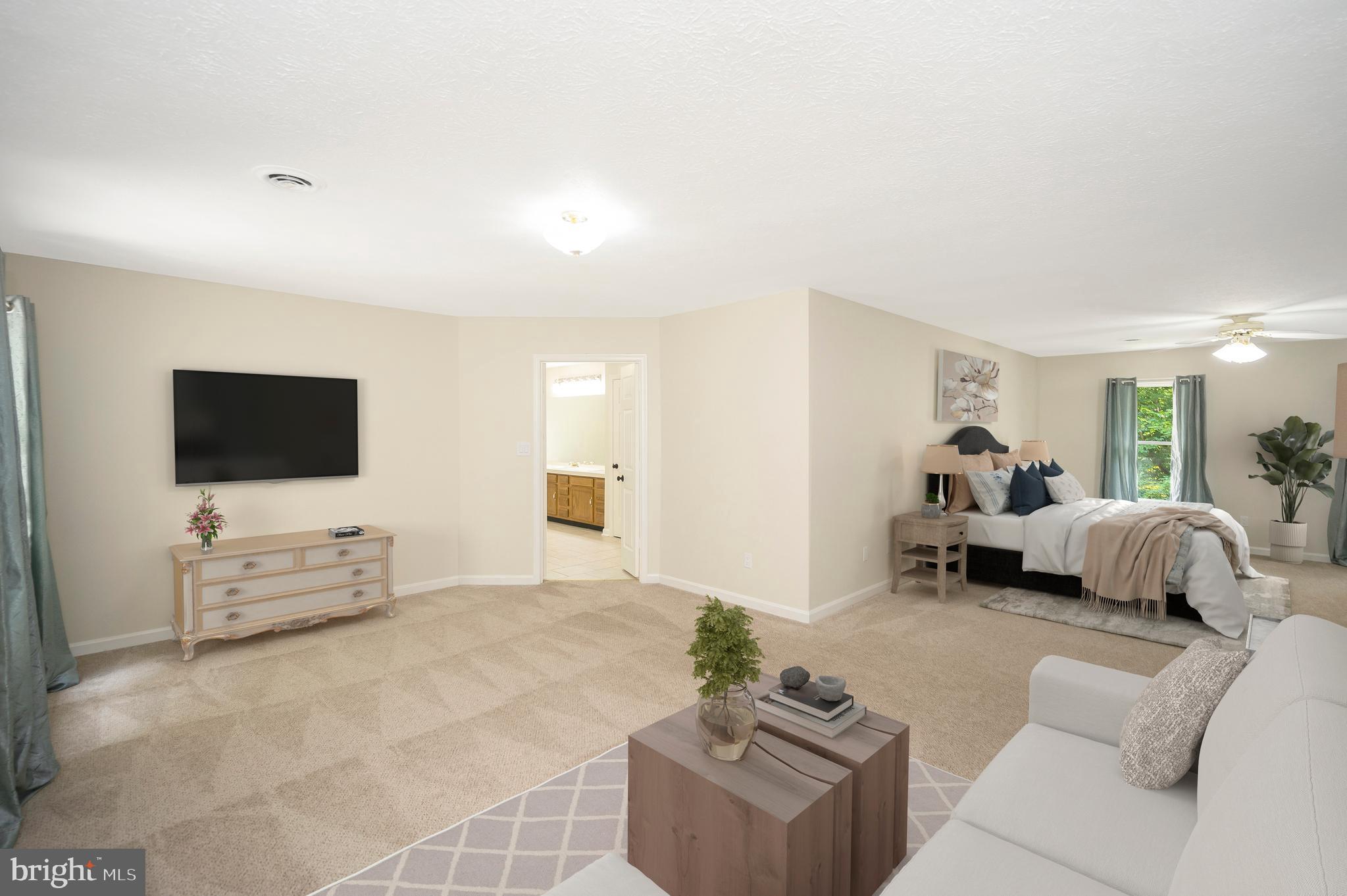 104 Dent Road Stafford, VA 22554 - Photo 29 of 118 a living room with furniture and a flat screen tv