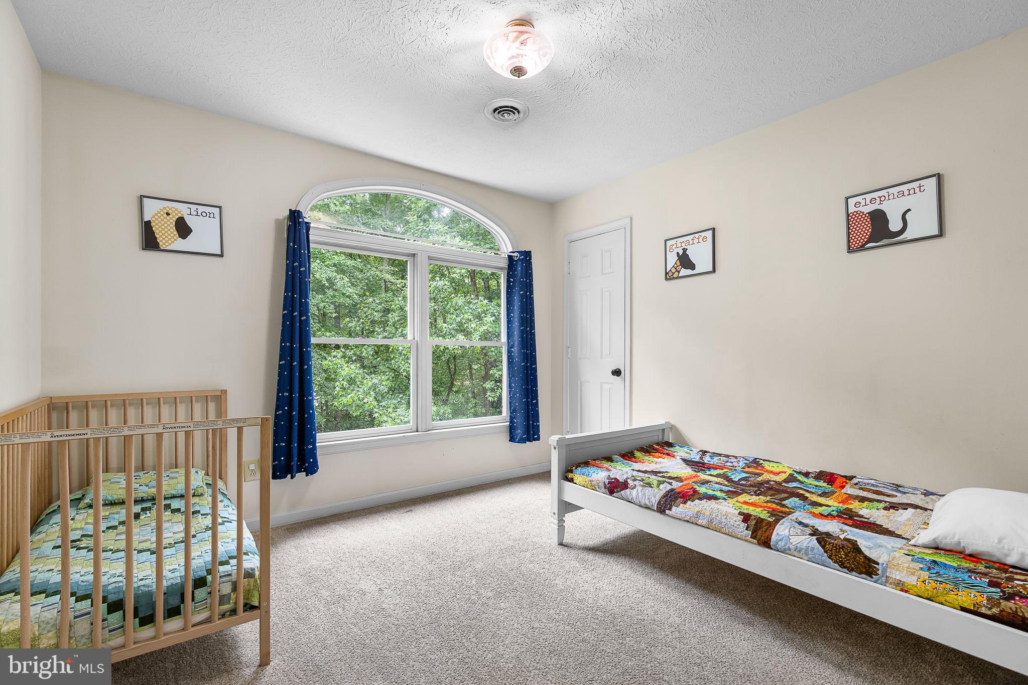 104 Dent Road Stafford, VA 22554 - Photo 43 of 118 a bedroom with bed and a window