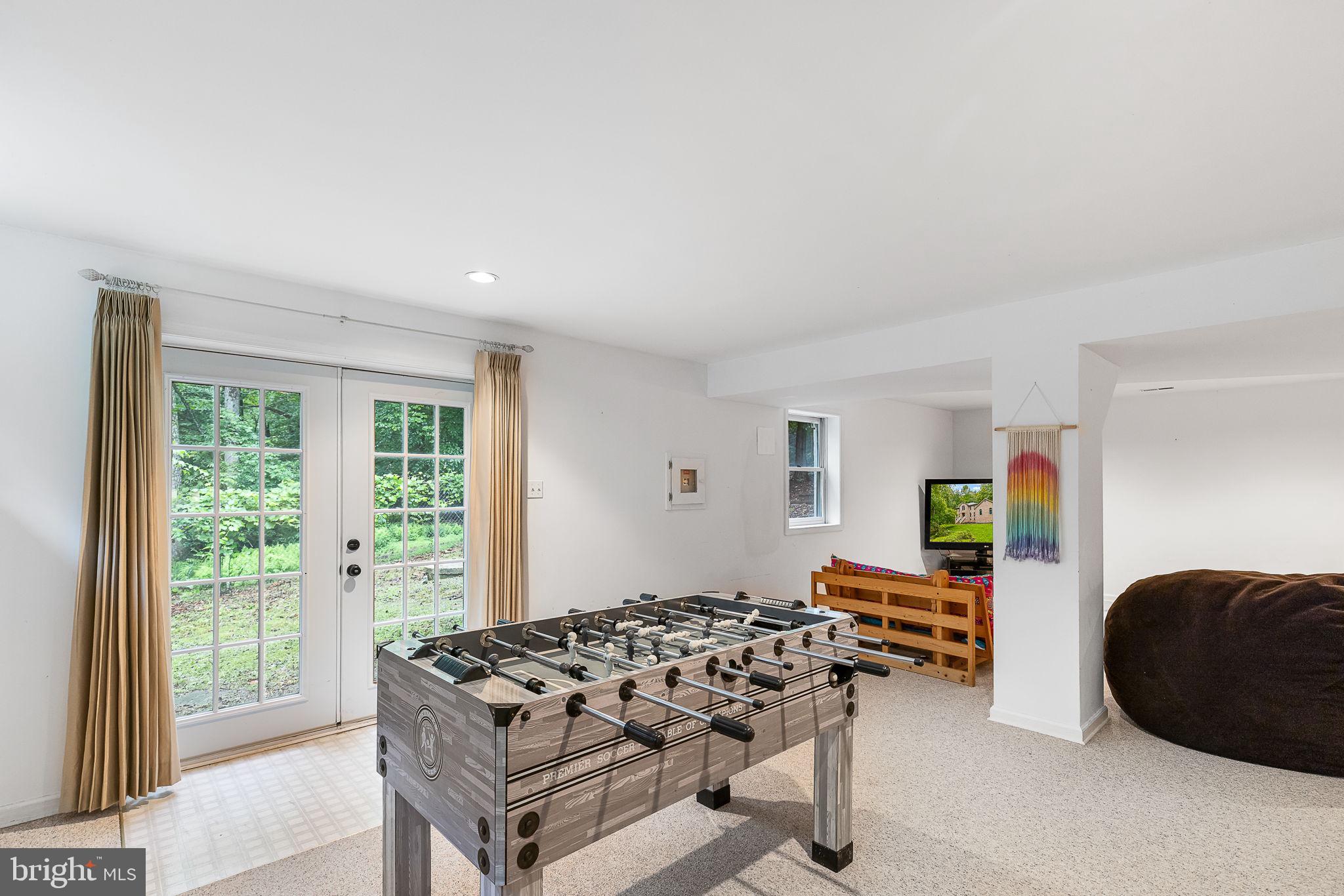 104 Dent Road Stafford, VA 22554 - Photo 54 of 118 a living room with furniture and a large window