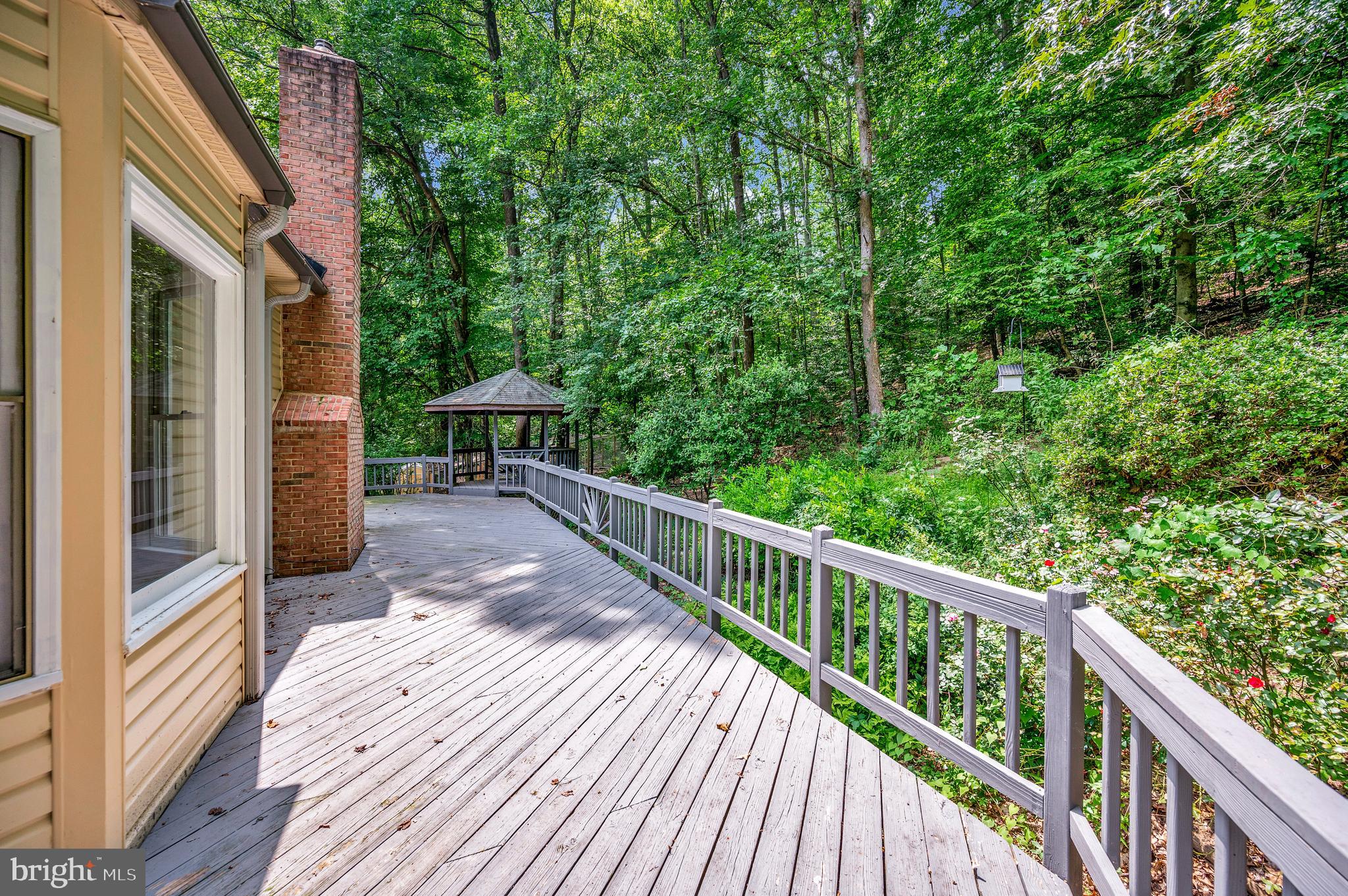 104 Dent Road Stafford, VA 22554 - Photo 83 of 118 Back deck with view to the gazebo