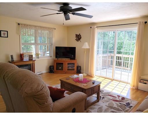 7 Blackmore Pond Road Wareham, MA 02576 - Photo 3 of 21 a living room with furniture and a flat screen tv