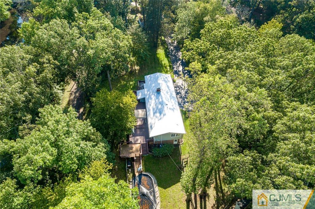 33 Davidson's Mill Road North Brunswick, NJ 08902 - Photo 56 of 58 an aerial view of a house with a yard and garden