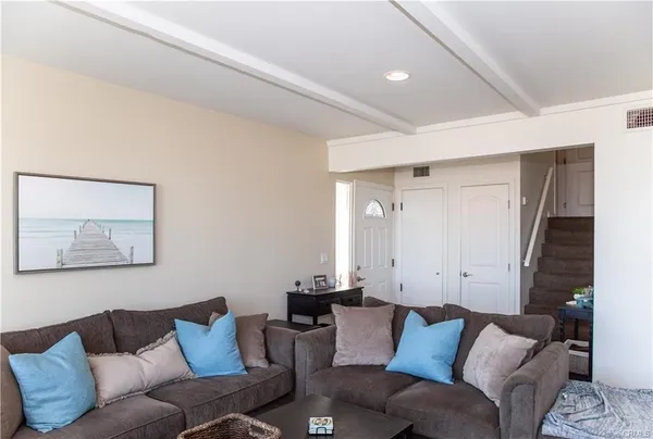 a living room with furniture and a couch