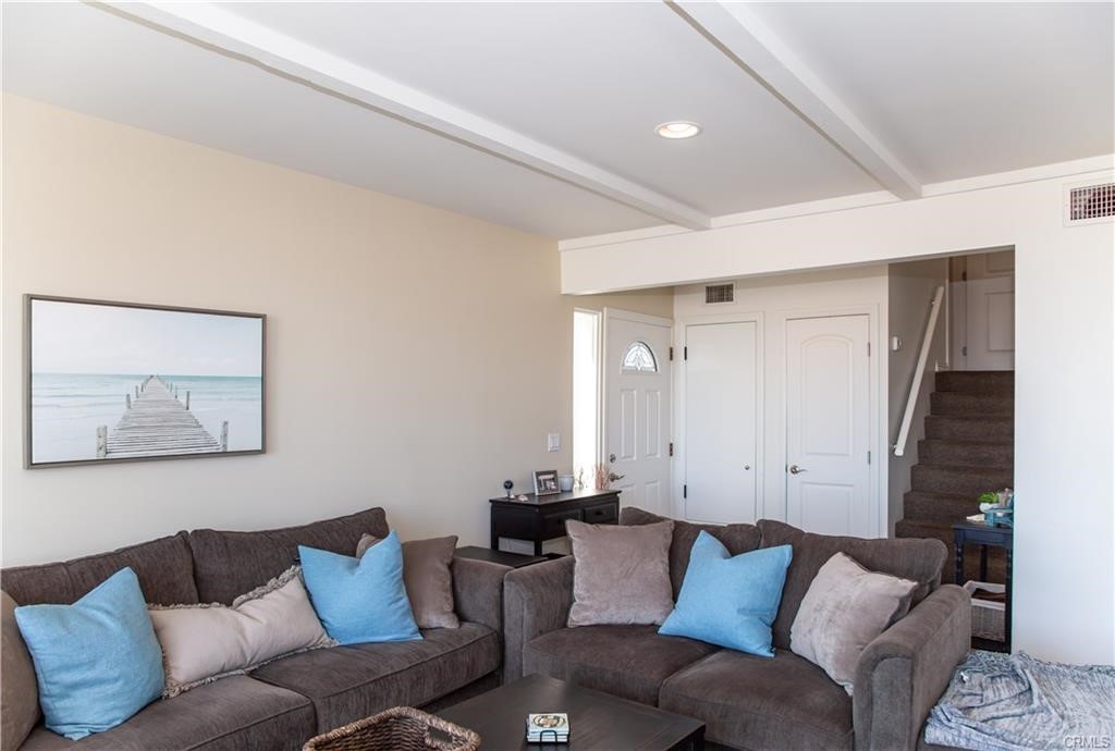 35 Surfside Avenue Surfside, CA 90743 - Photo 12 of 34 a living room with furniture and a couch