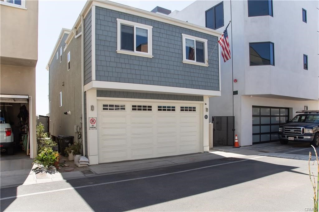 35 Surfside Avenue Surfside, CA 90743 - Photo 2 of 34 a front view of a building with parking space