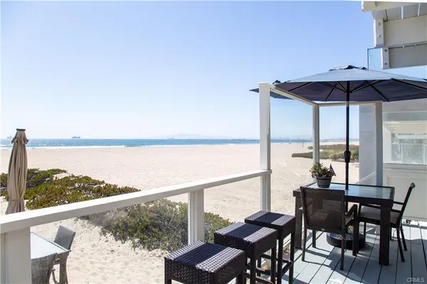 an outdoor view from balcony with furniture