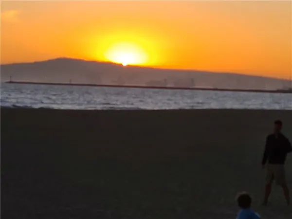 a view of house with backyard
