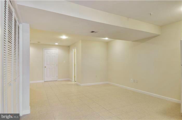 18804 Broken Oak Road Boyds, MD 20841 - Photo 25 of 28 Lower level family room