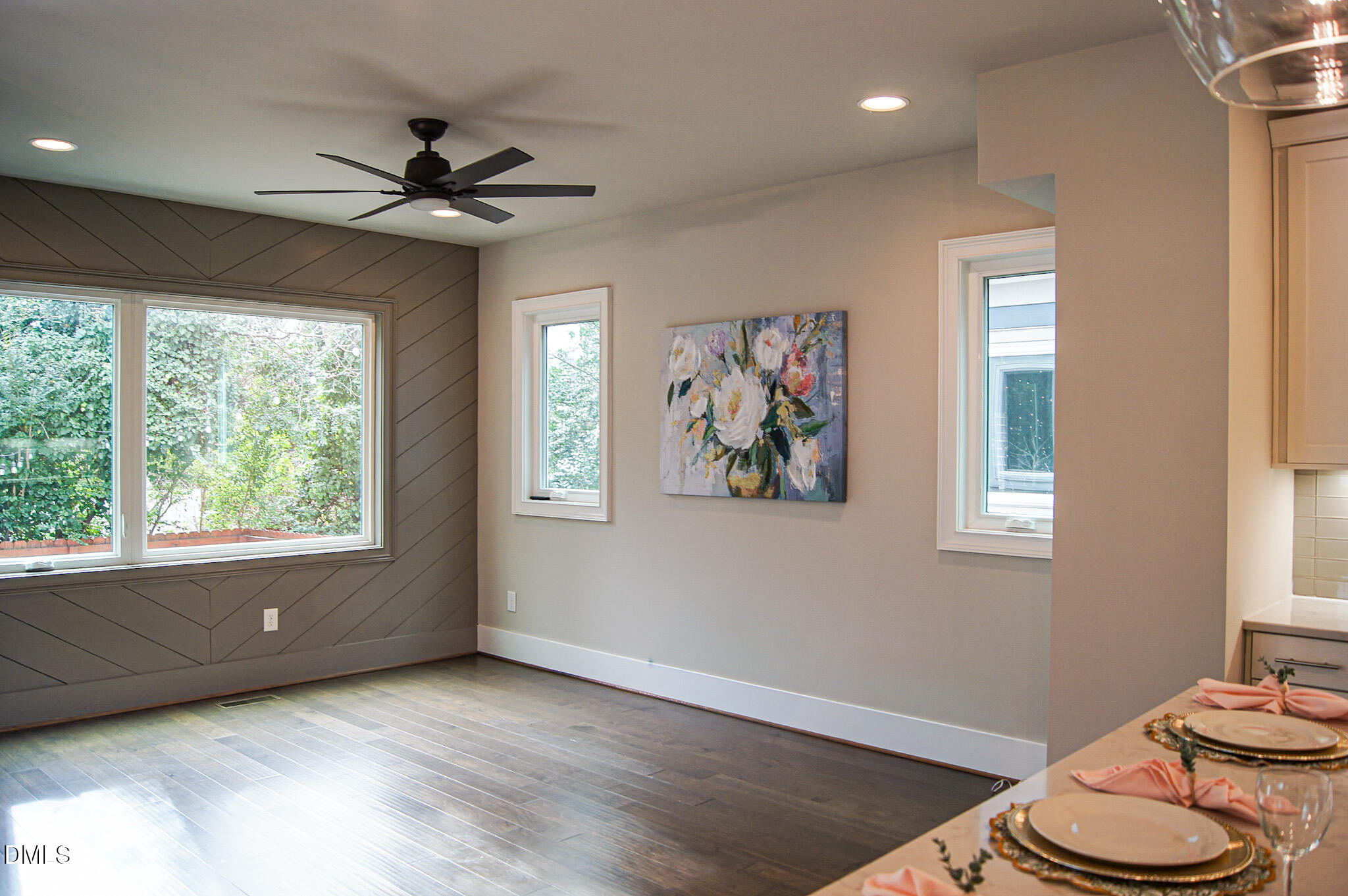 1208 Boyer Street Raleigh, NC 27610 - Photo 10 of 58 a view of a livingroom with a ceiling fan and window