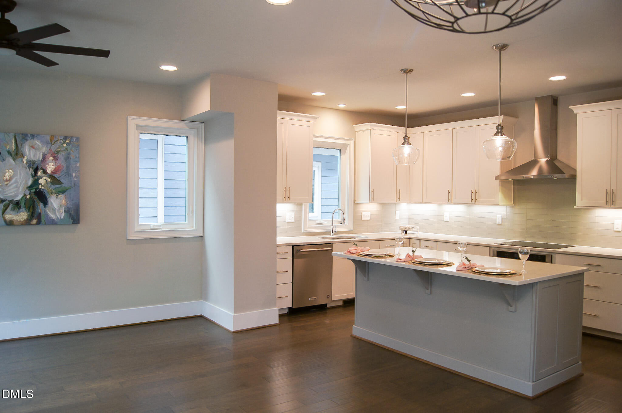 1208 Boyer Street Raleigh, NC 27610 - Photo 12 of 58 a kitchen with stainless steel appliances granite countertop a sink a stove a refrigerator and a microwave