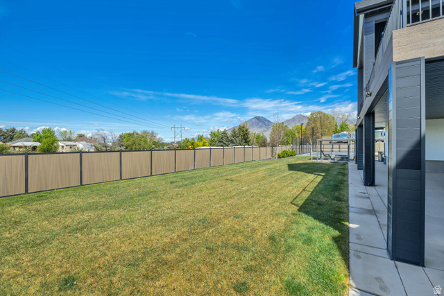 1720 Hillcrest Circle Mapleton, UT 84664 - Photo 104 of 116 Fenced backyard with a mountain view and a patio area