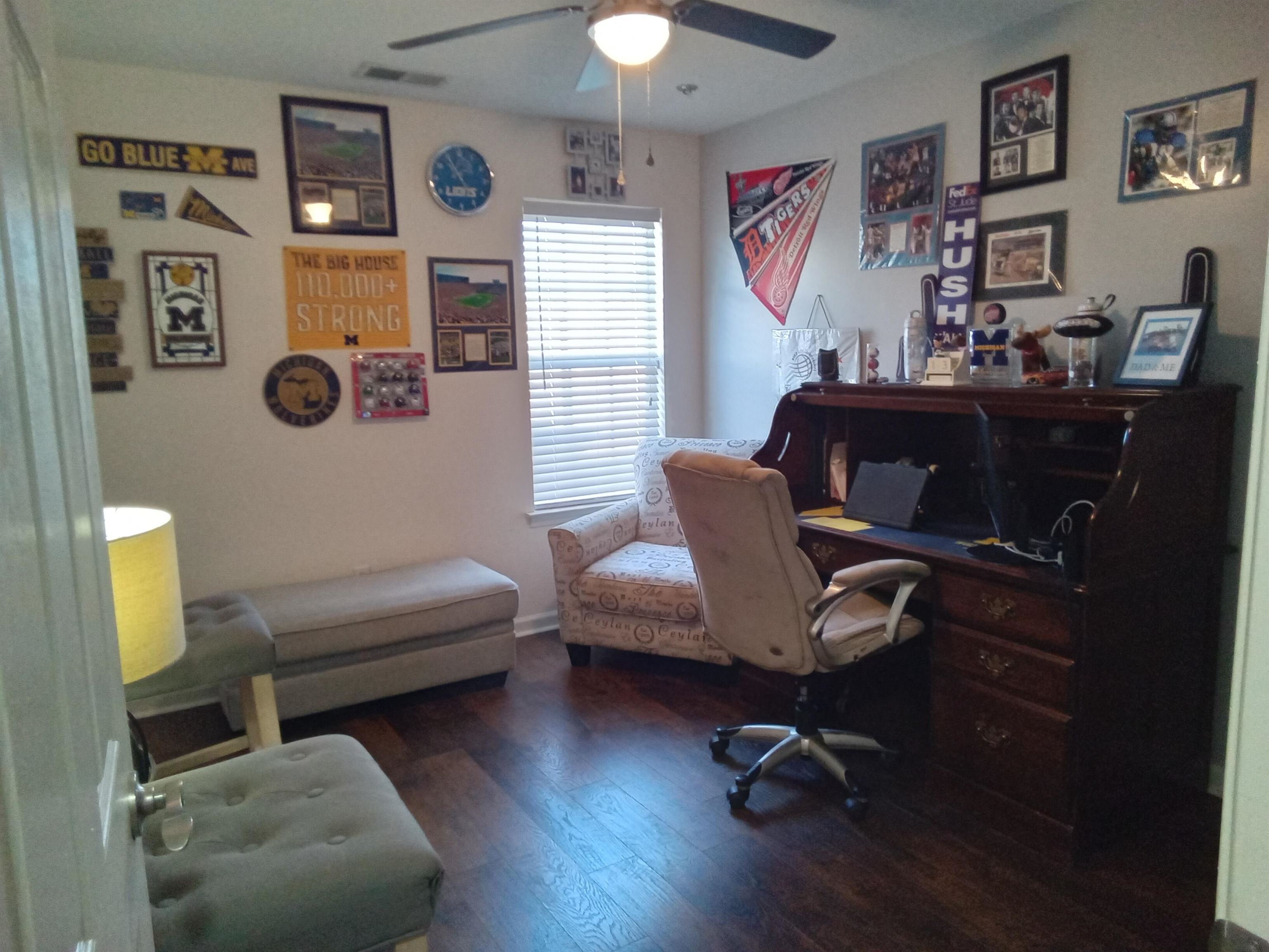 6907 Manslick Road Cordova, TN 38018 - Photo 13 of 24 Home office featuring dark wood-style flooring and a ceiling fan