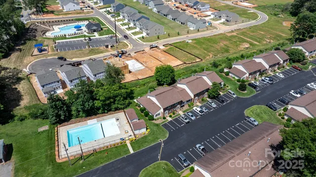 an aerial view of a house with a garden