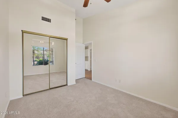 a view of a backyard with a garden and plants