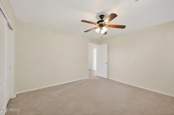 a view of a backyard house and patio