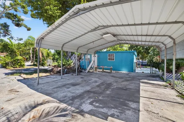a view of a backyard with a patio