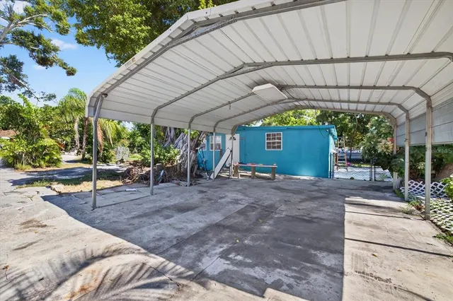 a view of a backyard with a patio