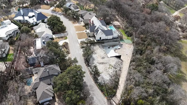 an aerial view of residential house with outdoor space