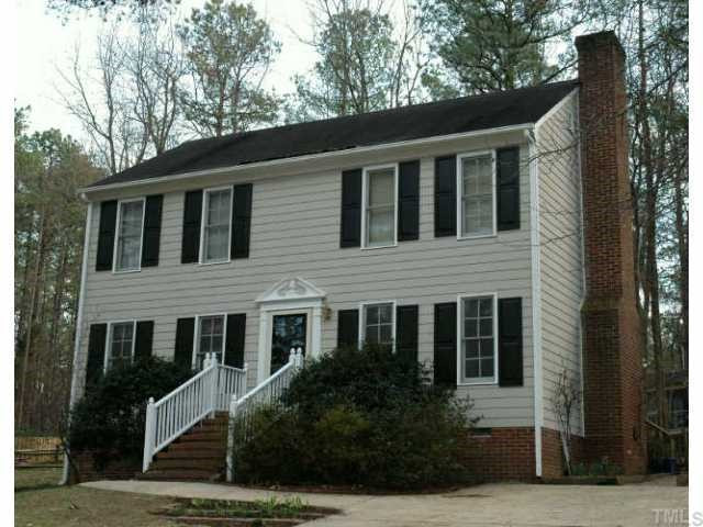 Two story Woodcroft home on great lot with attractive sideyard and backyard! Exterior Front
