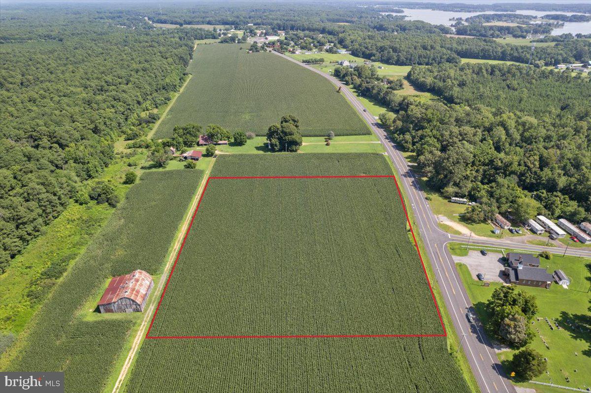 49430 Harry James Road Ridge, MD 20680 - Photo 3 of 11 a view of a balcony with a floor to ceiling window