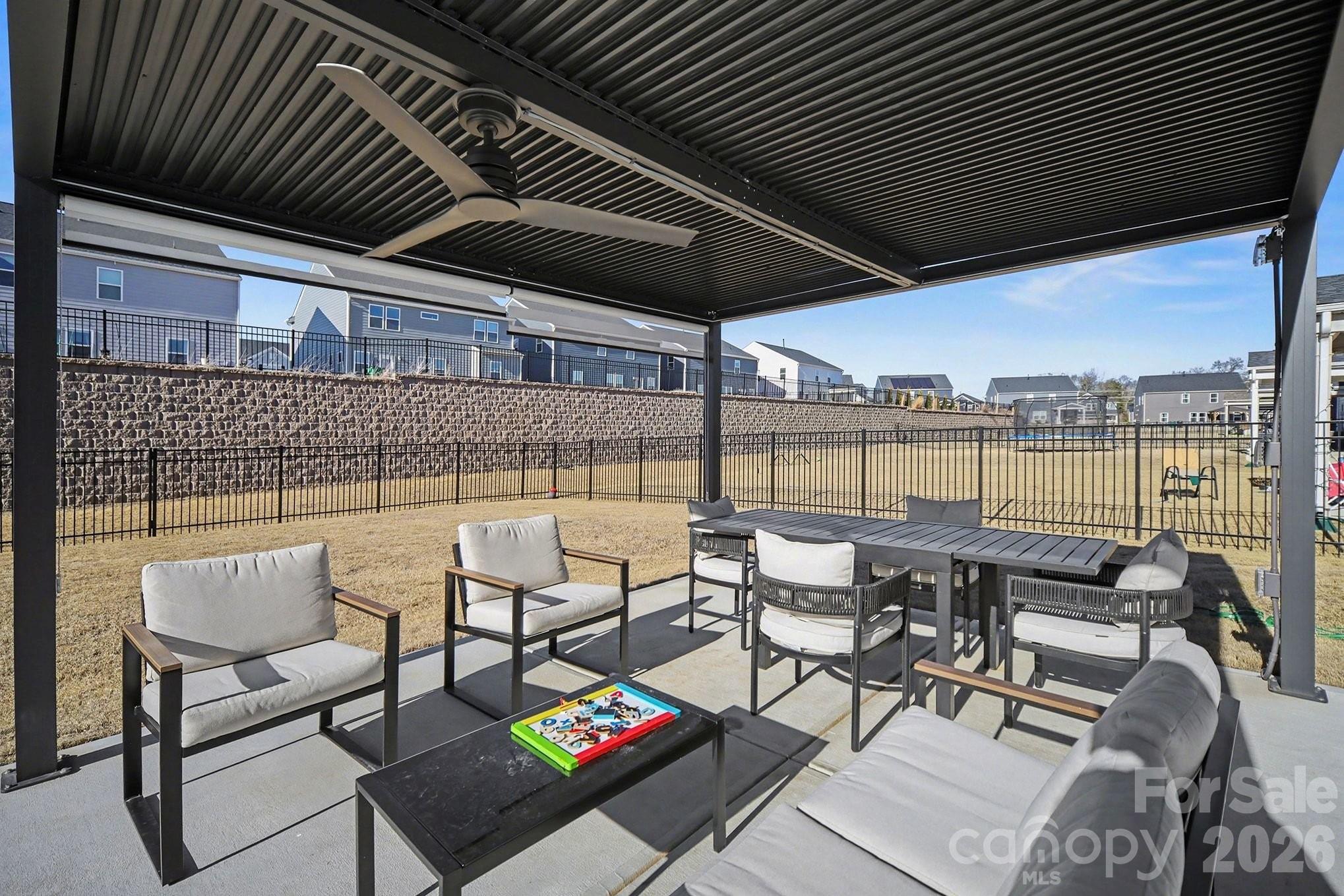 11122 Glasden Road Charlotte, NC 28278 - Photo 27 of 32 a roof deck with table and chairs