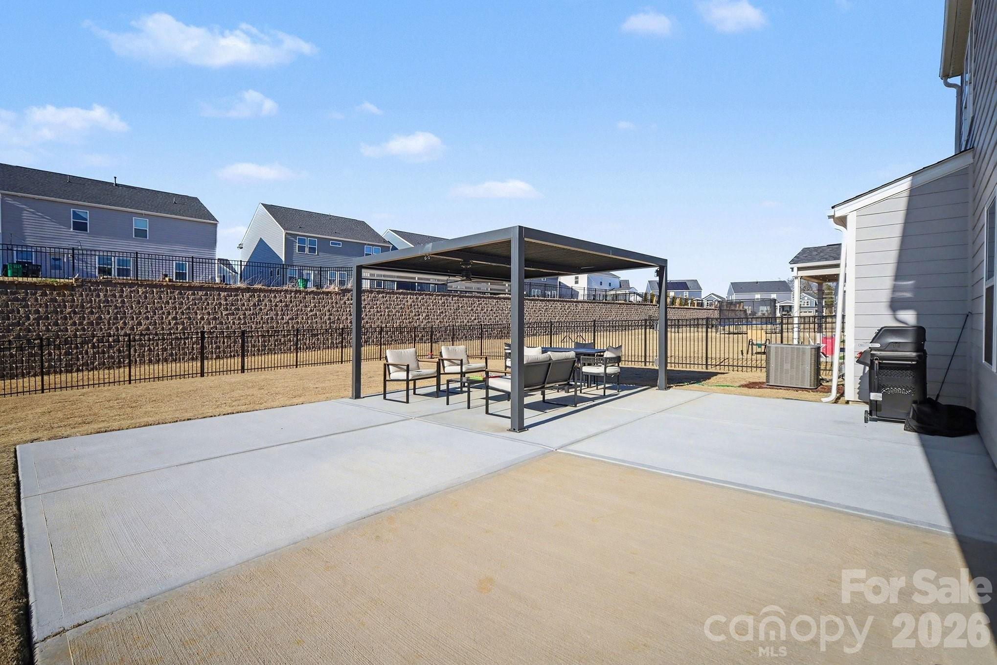 11122 Glasden Road Charlotte, NC 28278 - Photo 29 of 32 a view of a terrace with chairs