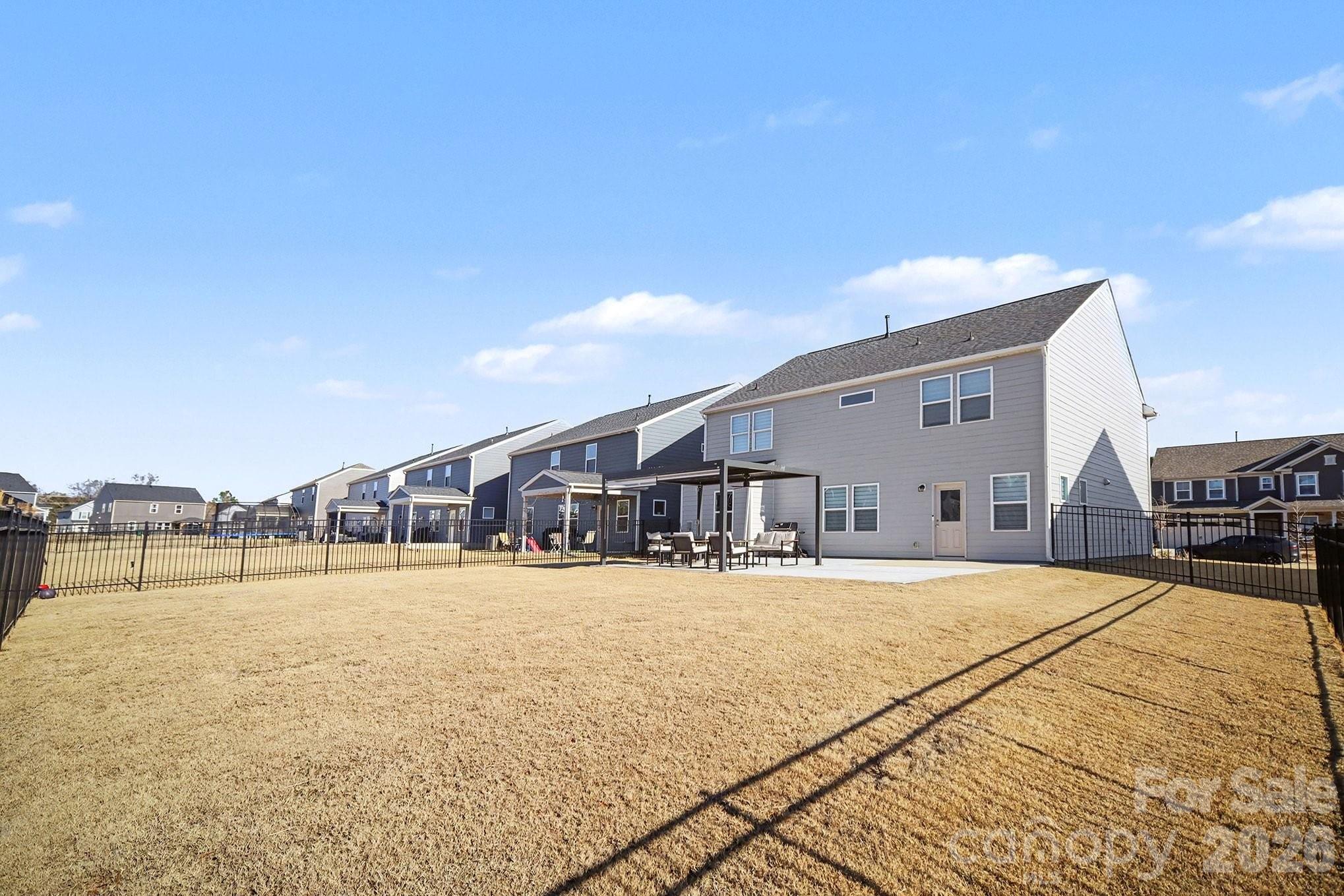 11122 Glasden Road Charlotte, NC 28278 - Photo 32 of 32 a swimming pool with outdoor seating and yard