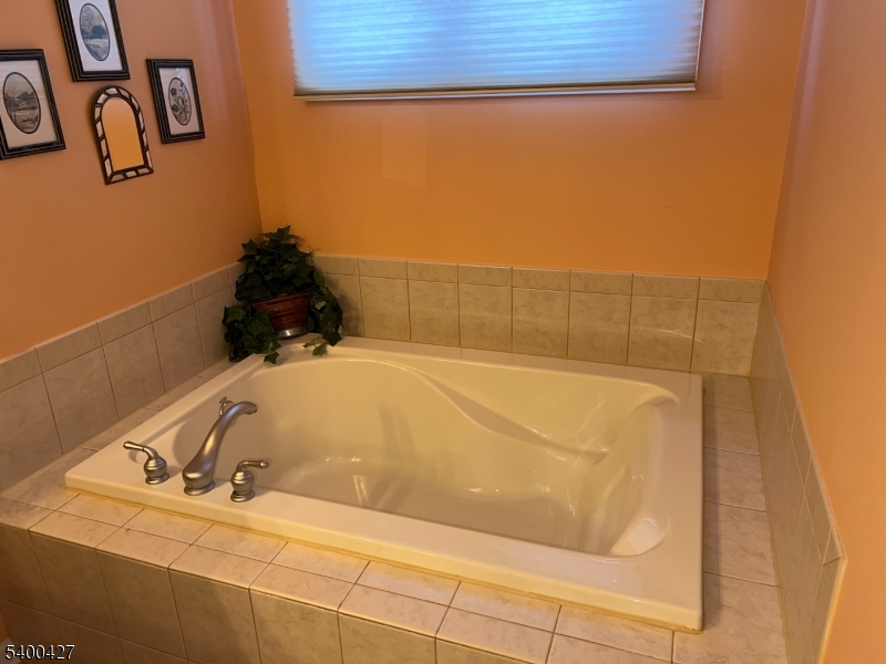 18 Bayard Road Somerset, NJ 08873 - Photo 11 of 15 a bathroom with a bathtub