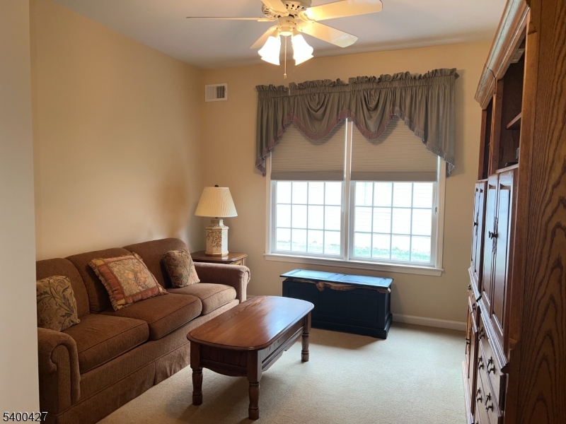 18 Bayard Road Somerset, NJ 08873 - Photo 12 of 15 a living room with furniture and a window