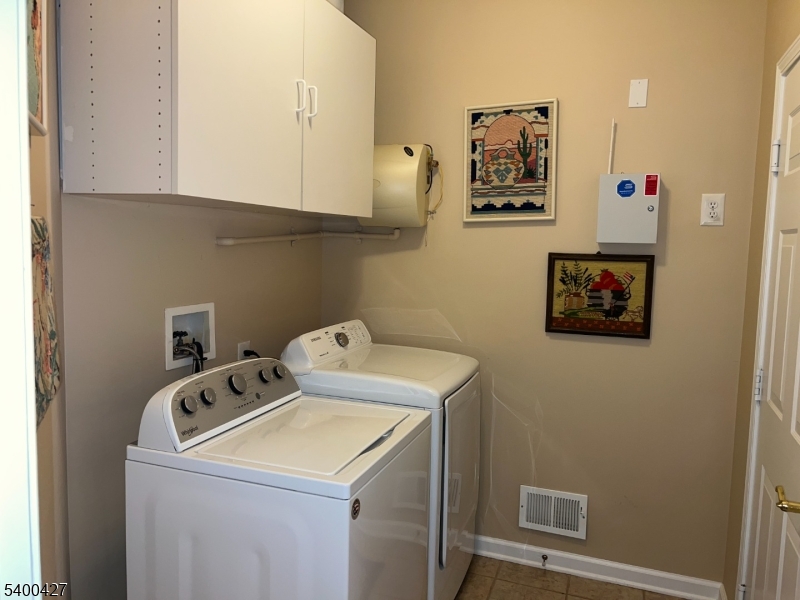 18 Bayard Road Somerset, NJ 08873 - Photo 14 of 15 a utility room with dryer and washer