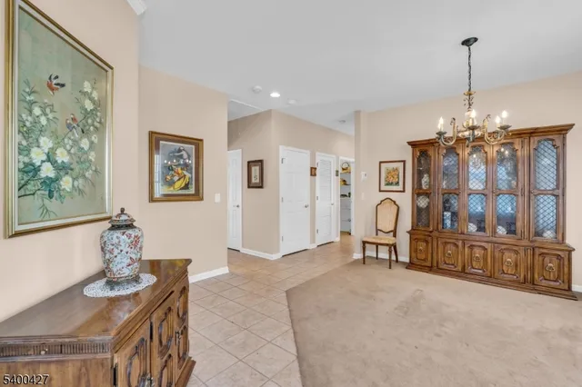 a view of livingroom with furniture cabinet and window
