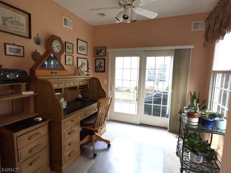18 Bayard Road Somerset, NJ 08873 - Photo 9 of 15 a view of a workspace with furniture and a window
