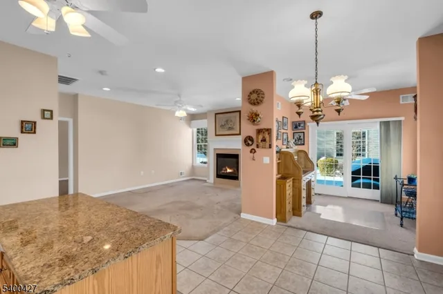 a view of a kitchen and microwave