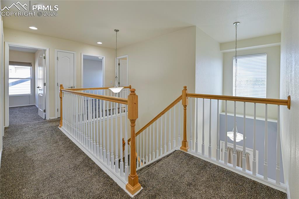 6432 Crystal Mountain Road Colorado Springs, CO 80923 - Photo 14 of 31 a view of hallway with livingroom