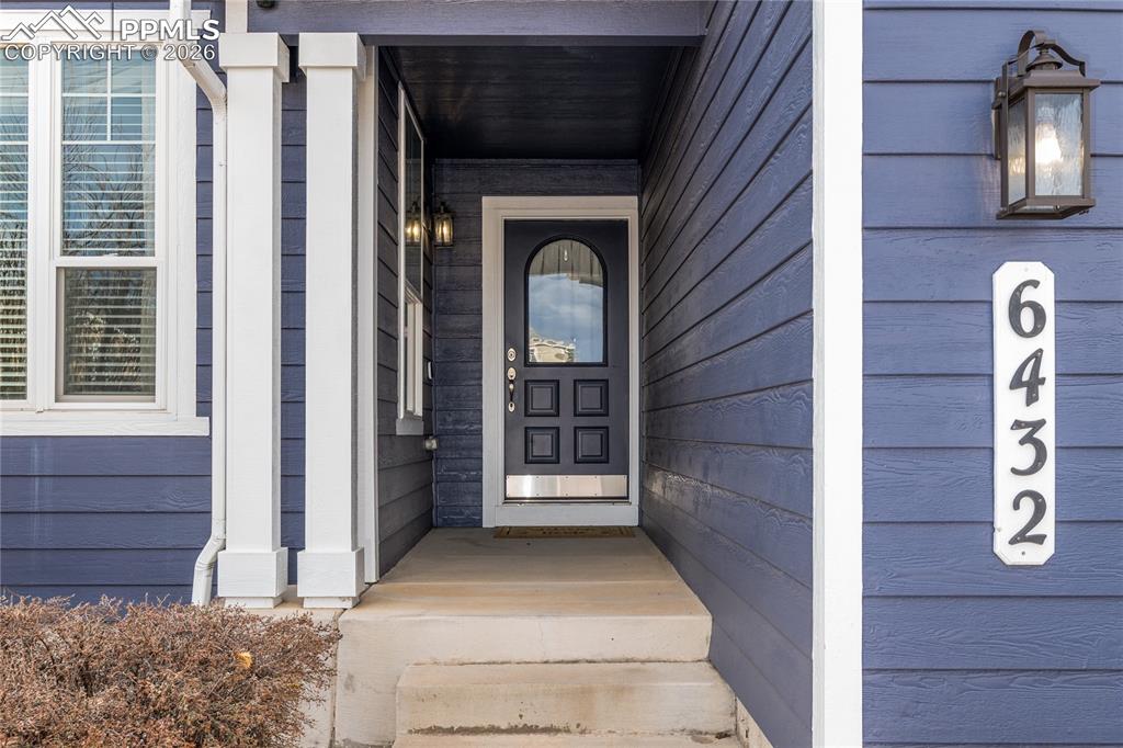 6432 Crystal Mountain Road Colorado Springs, CO 80923 - Photo 2 of 31 a view of front door of house