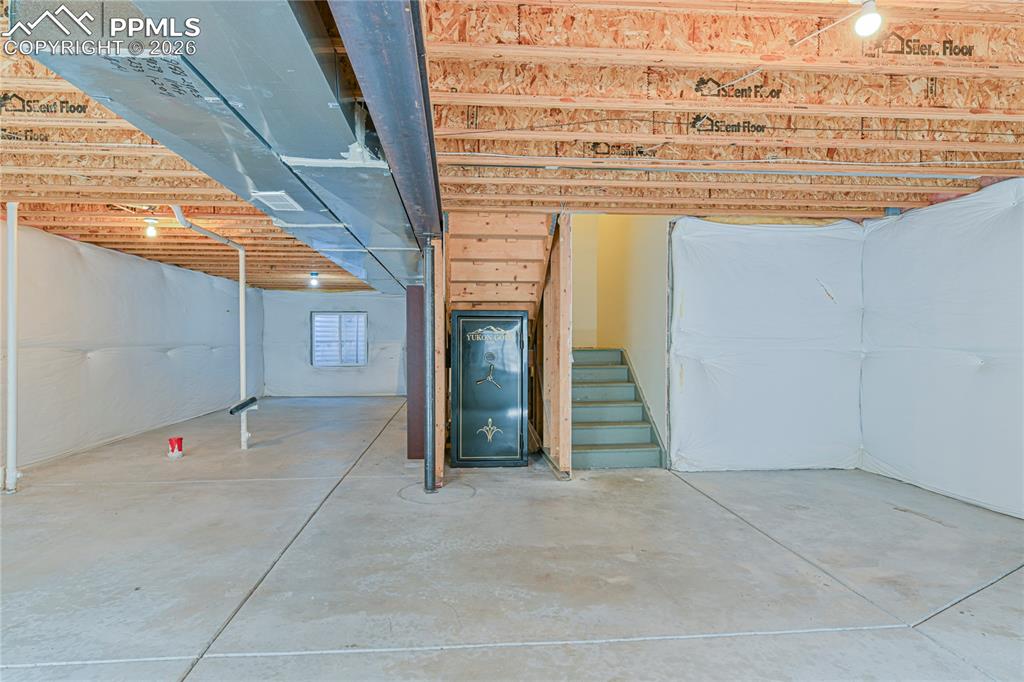 6432 Crystal Mountain Road Colorado Springs, CO 80923 - Photo 26 of 31 a view of a wooden door with an outdoor space