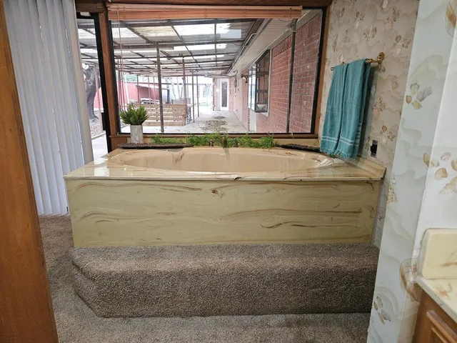 a view of an empty room with window