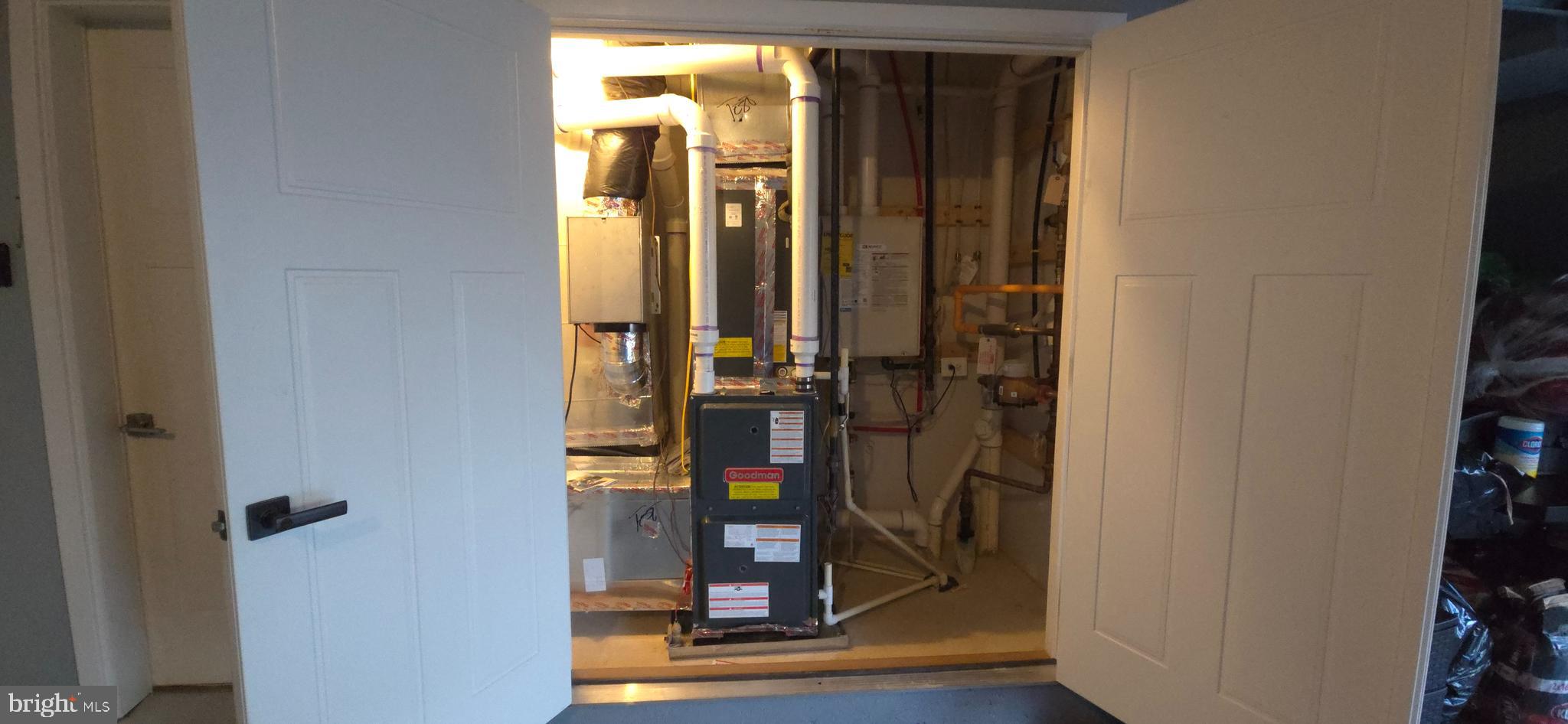 10510 Norbourne Farm Road Upper Marlboro, MD 20772 - Photo 49 of 56 Utility Closet w/Tankless Water Heater in Garage