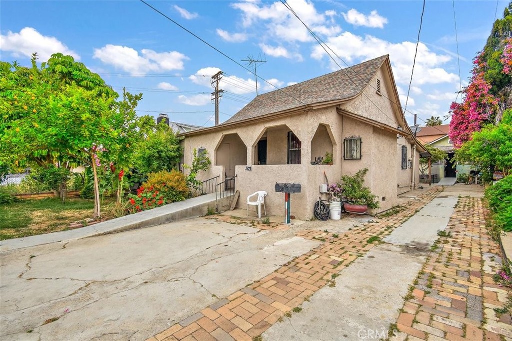 a front view of a house with a patio