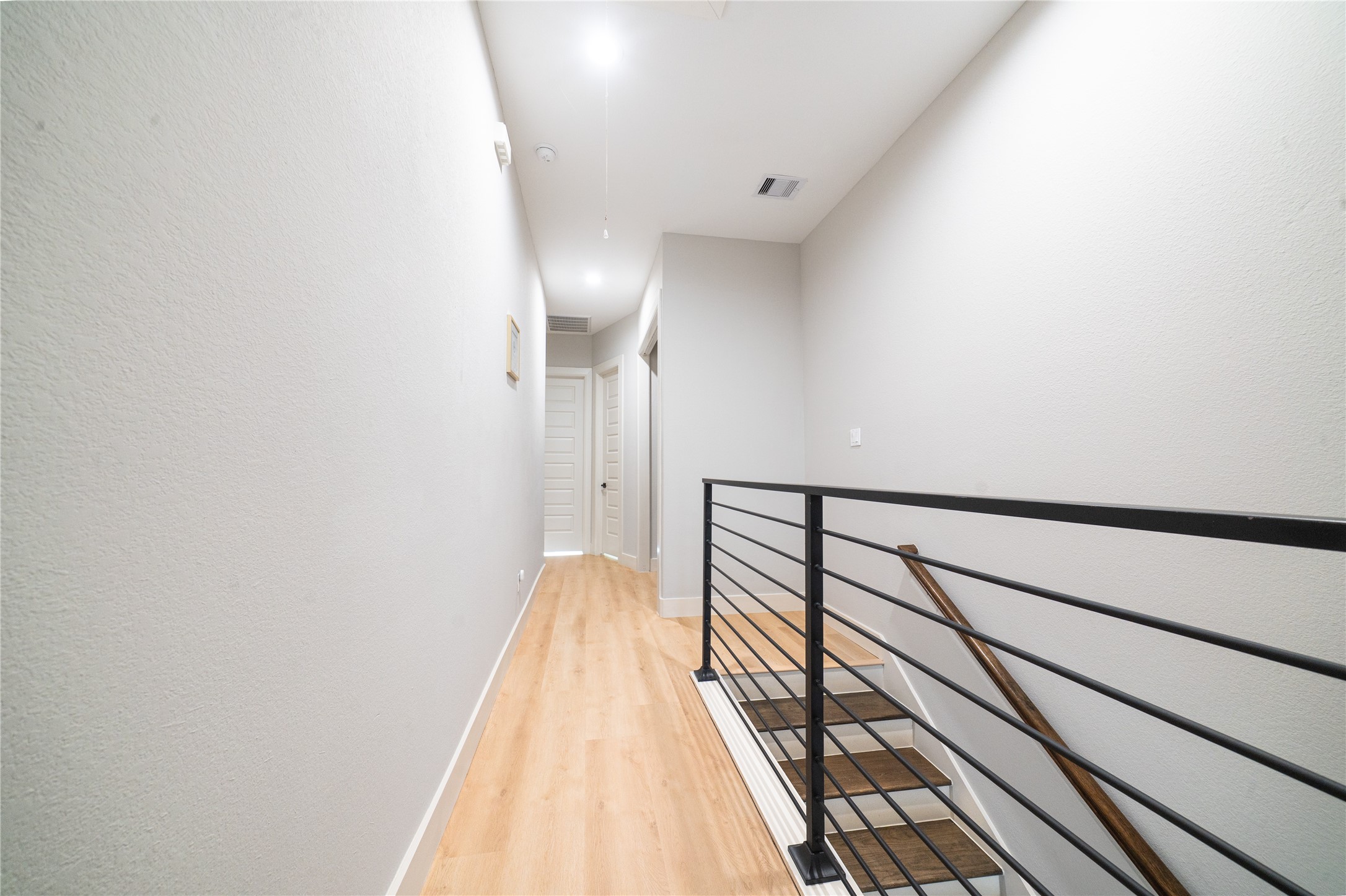 4607 Nolda Street, Unit B Houston, TX 77007 - Photo 6 of 14 Modern look metal railing with modern finishes throughout.