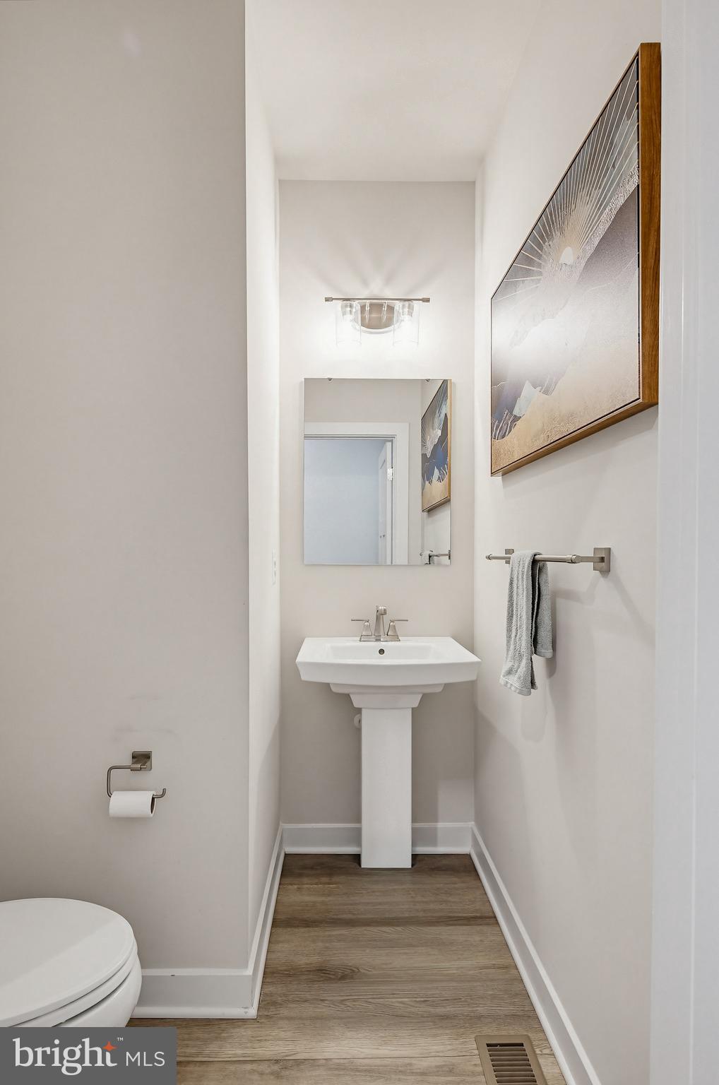 3172 Dodder Way Odenton, MD 21113 - Photo 21 of 59 a bathroom with a sink toilet and mirror