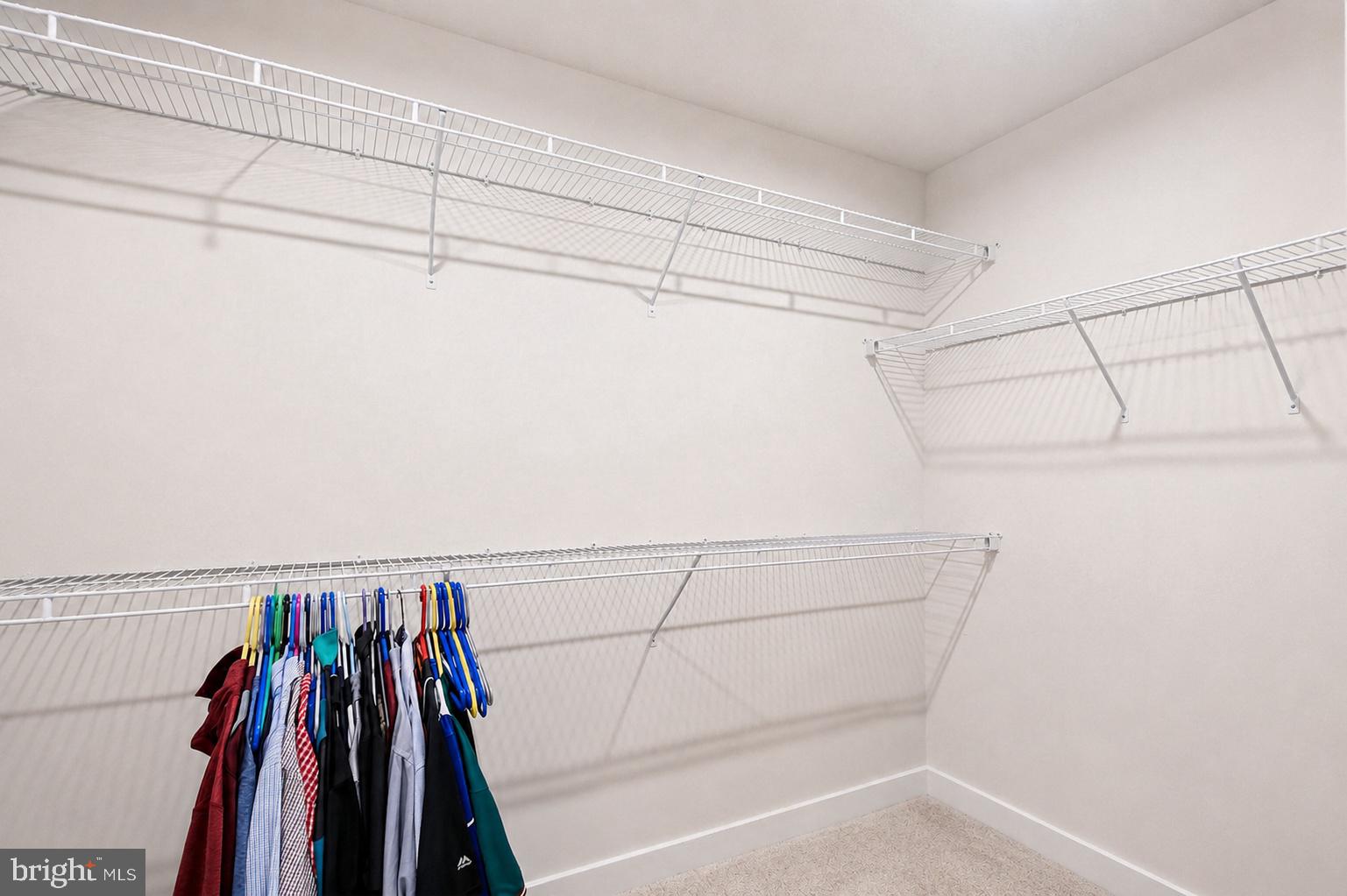 3172 Dodder Way Odenton, MD 21113 - Photo 30 of 59 a view of walk in closet with clothes and shoes