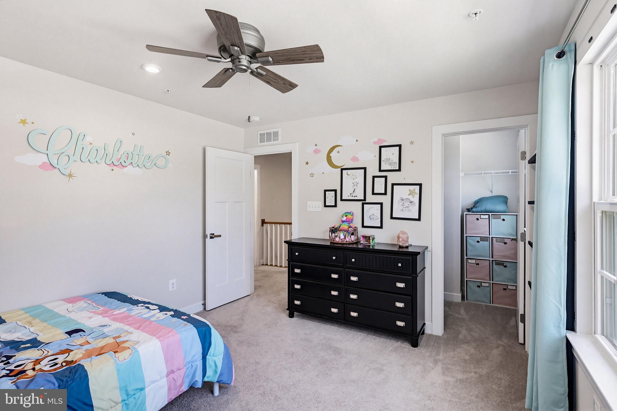 3172 Dodder Way Odenton, MD 21113 - Photo 35 of 59 a bedroom with a bed and a chandelier