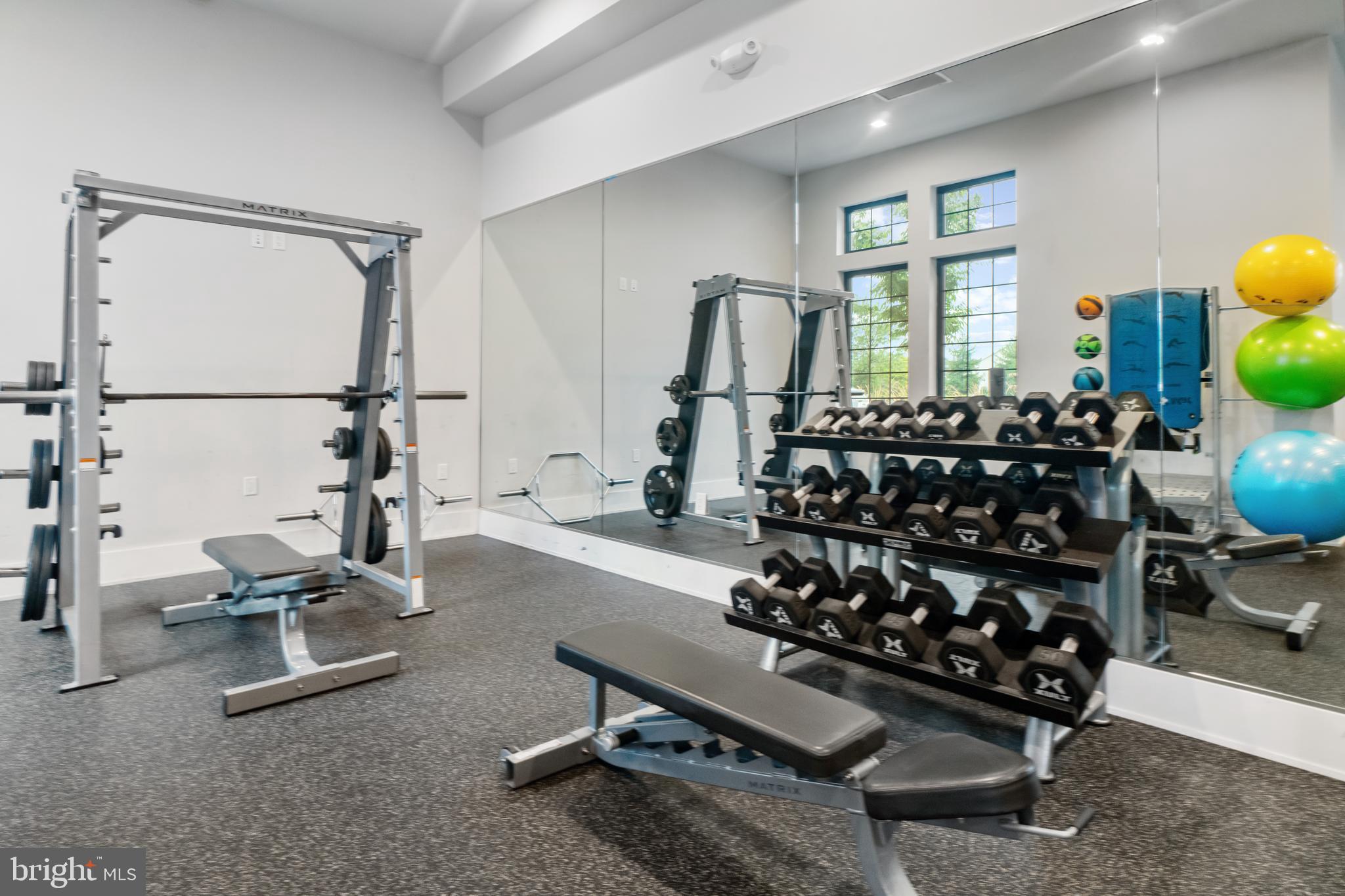 3172 Dodder Way Odenton, MD 21113 - Photo 59 of 59 a room with gym equipment and a large window