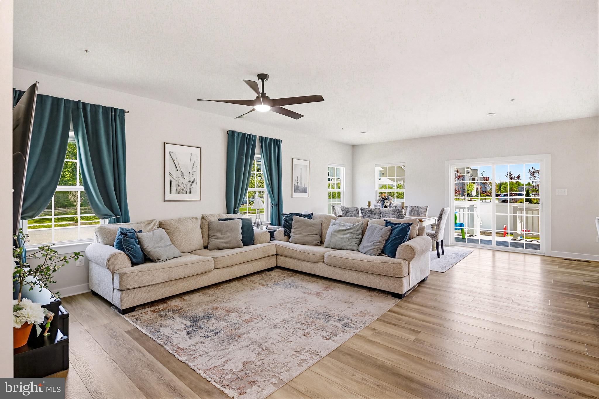 3172 Dodder Way Odenton, MD 21113 - Photo 6 of 59 a living room with furniture and a large window