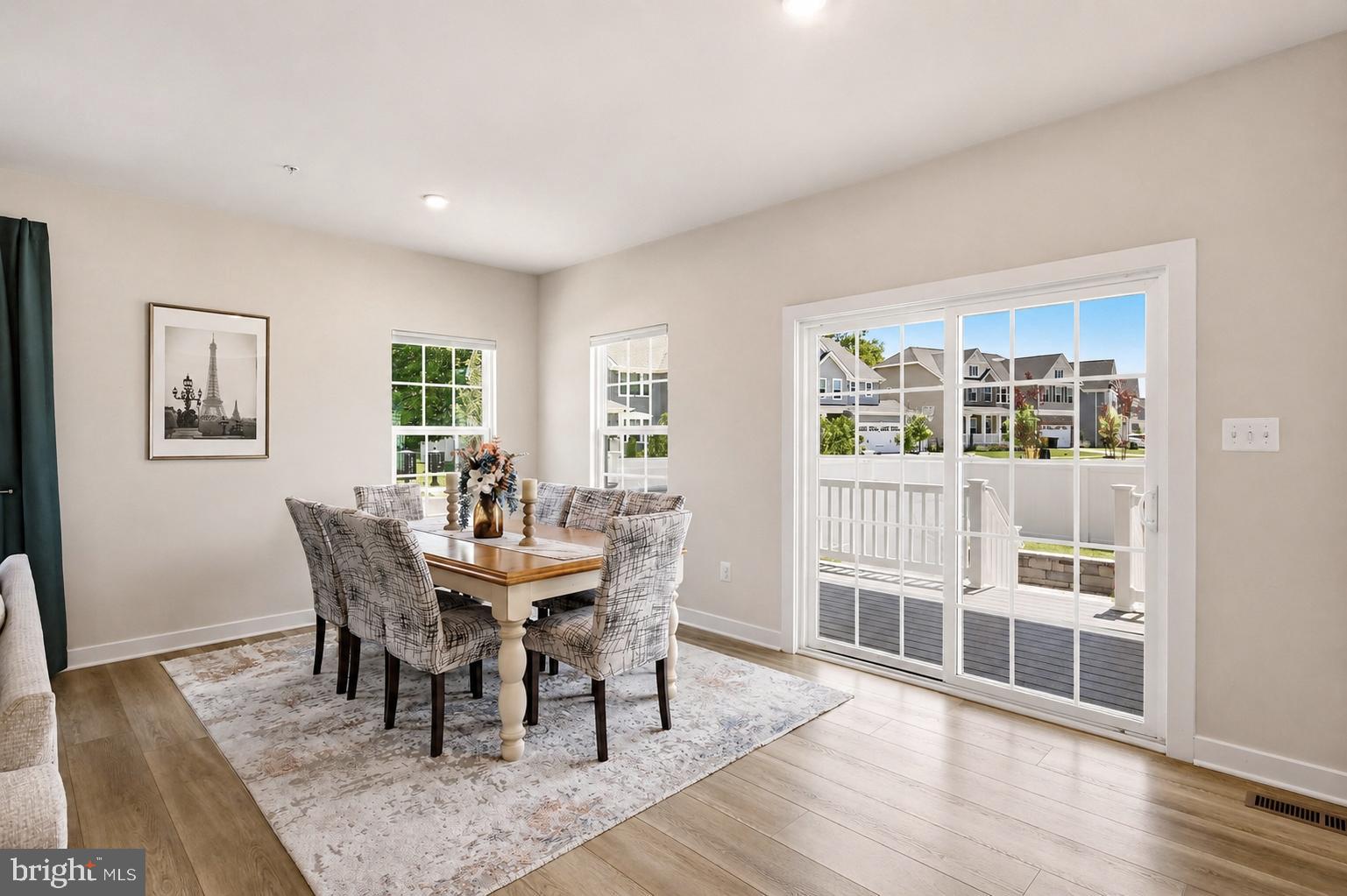 3172 Dodder Way Odenton, MD 21113 - Photo 9 of 59 a view of a dining room with furniture window and wooden floor